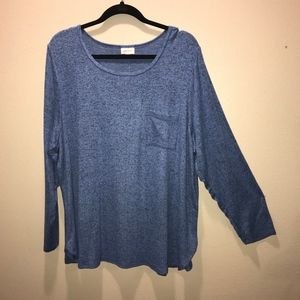Lightweight blue sweater with pocket accent